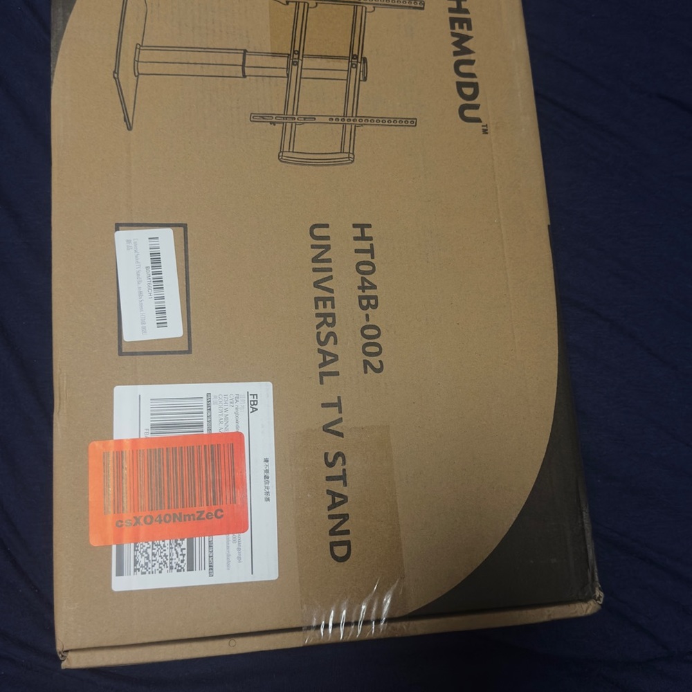 HEMUDU Universal TV Stand HT04B-002 - Brown Cardboard Packaging